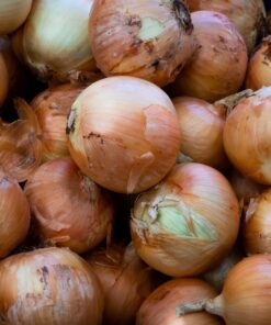 garlic lot on brown wooden table