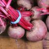 turnips on brown wooden surface